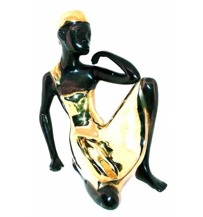 Sculpture africaine en bronze BRZ0009 ( H .35 x L :35 Cm ) Poids : 5 Kg 